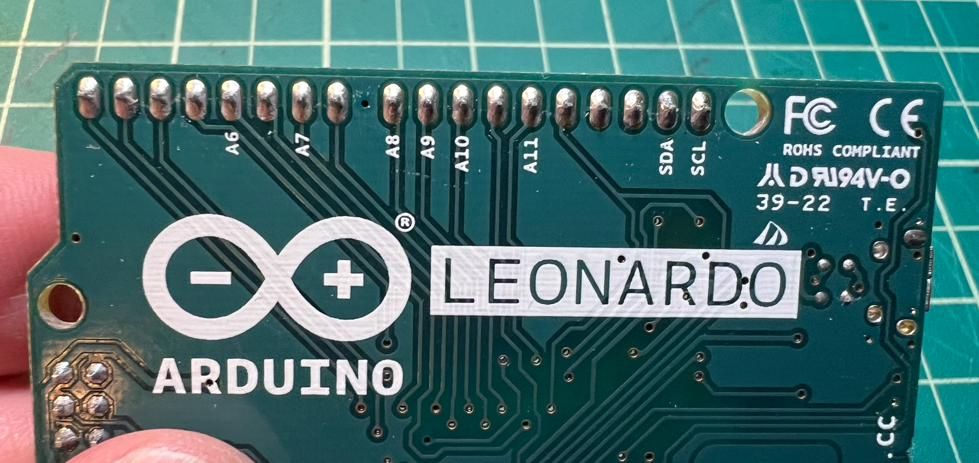 Arduino Leonardo has six extra analog inputs, as labeled on the back of the board